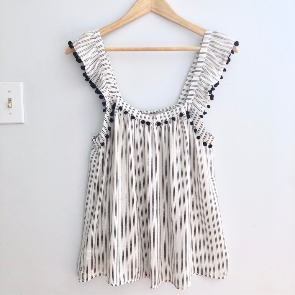 LOFT Ruffle straps with tassels.